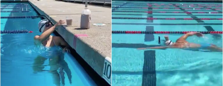 Atleta Olímpica Mostra Habilidade Ao Nadar Com Copo De Leite Na Cabeça Atleta Olímpica Mostra Habilidade Ao Nadar Com Copo De Leite Na Cabeça